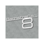 Schriftzug mit Straße & Hausnummer aus Edelstahl in Verkehrsweiß RAL 9016
