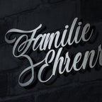 Design-Namensschriftzug aus Edelstahl